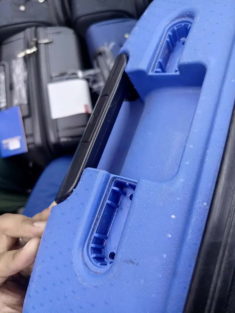 Suitcase handle repair at Al Amwaj Footwear